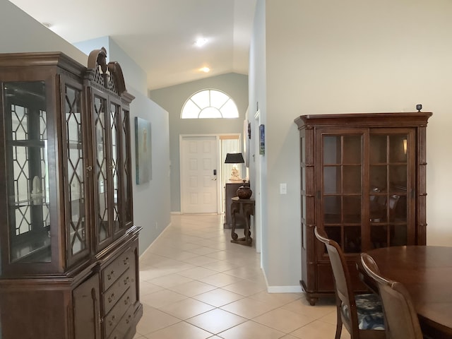 7007 Ashton St, Boynton Beach, FL 33437 - corridor with light tile patterned floors, baseboards, and vaulted ceiling