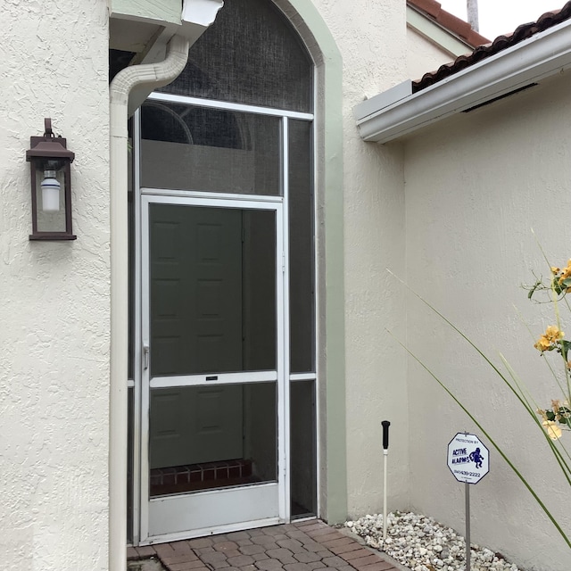 7007 Ashton St, Boynton Beach, FL 33437 - view of exterior entry with stucco siding