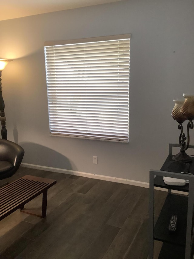 7007 Ashton St, Boynton Beach, FL 33437 - living area with dark wood-style flooring and baseboards