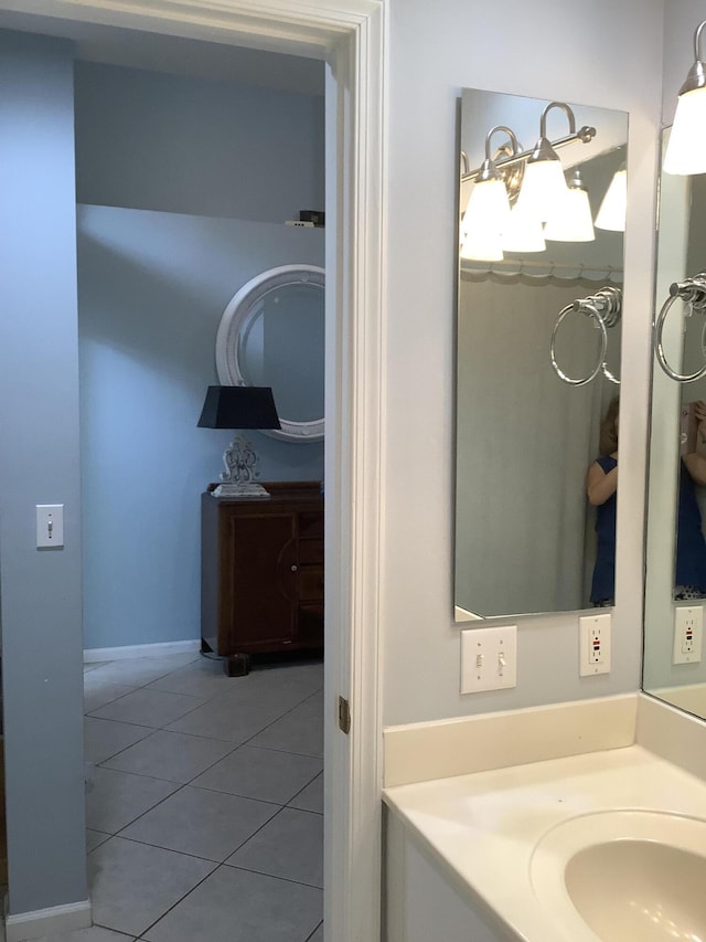 7007 Ashton St, Boynton Beach, FL 33437 - bathroom with tile patterned flooring and vanity