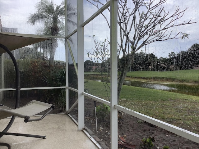7007 Ashton St, Boynton Beach, FL 33437 - unfurnished sunroom featuring a water view