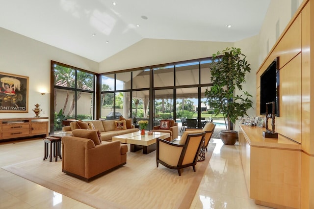 13315 Deauville Dr, Palm Beach Gardens, FL 33410 - living area with plenty of natural light, high vaulted ceiling, and light tile patterned flooring