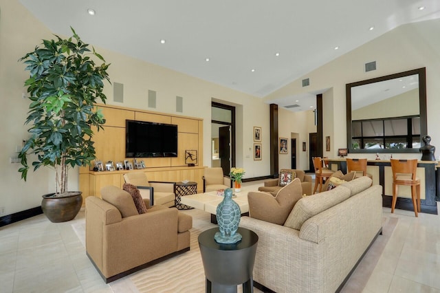 13315 Deauville Dr, Palm Beach Gardens, FL 33410 - living area featuring light tile patterned flooring, high vaulted ceiling, recessed lighting, and visible vents