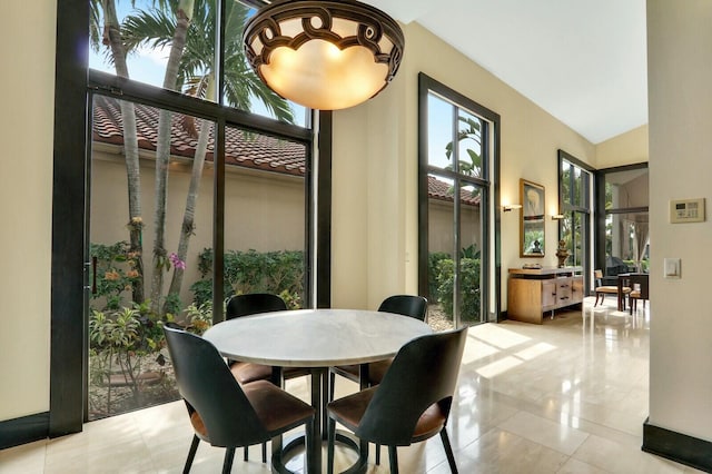 13315 Deauville Dr, Palm Beach Gardens, FL 33410 - dining room with light tile patterned floors