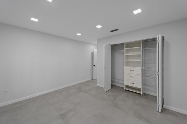 22586 Esplanada Dr, Boca Raton, FL 33433 - unfurnished bedroom featuring a closet, baseboards, and visible vents