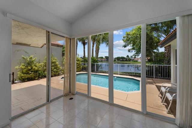 22586 Esplanada Dr, Boca Raton, FL 33433 - view of pool featuring a fenced backyard, a water view, a patio area, and a fenced in pool