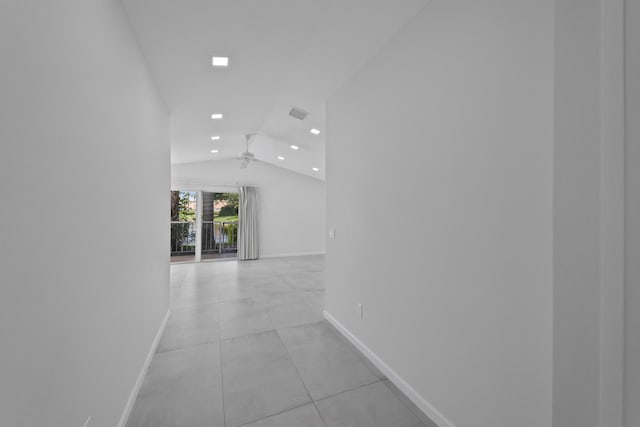 22586 Esplanada Dr, Boca Raton, FL 33433 - hallway featuring light tile patterned flooring, baseboards, vaulted ceiling, and visible vents
