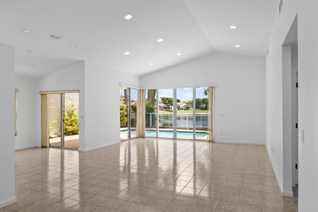 22586 Esplanada Dr, Boca Raton, FL 33433 - tiled spare room featuring baseboards, high vaulted ceiling, visible vents, and recessed lighting
