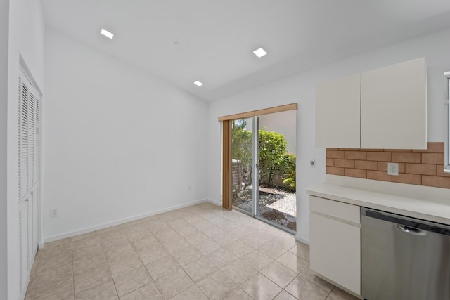 22586 Esplanada Dr, Boca Raton, FL 33433 - kitchen featuring light countertops, tasteful backsplash, lofted ceiling, baseboards, and dishwasher