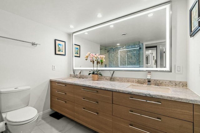 bathroom featuring double vanity, toilet, recessed lighting, a sink, and a stall shower
