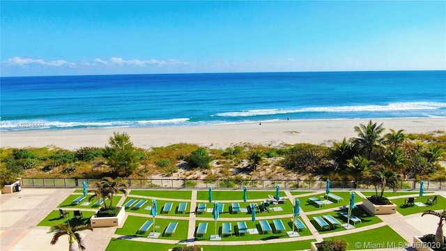 aerial view with a view of the beach and a water view