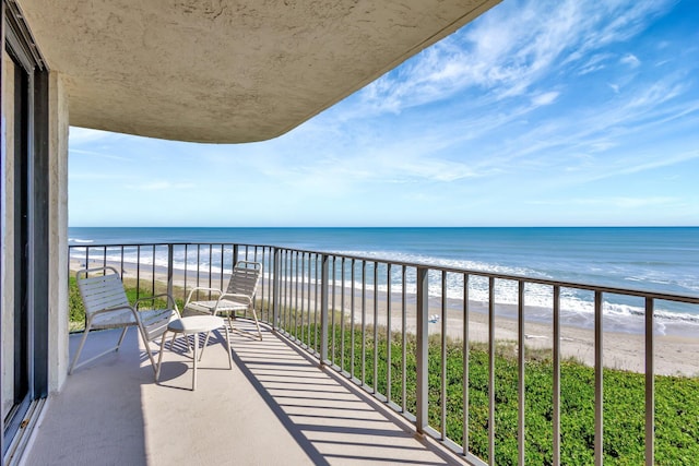 10000 S Ocean Dr S Unit 601, Jensen Beach, FL 34957 - balcony with a water view and a beach view