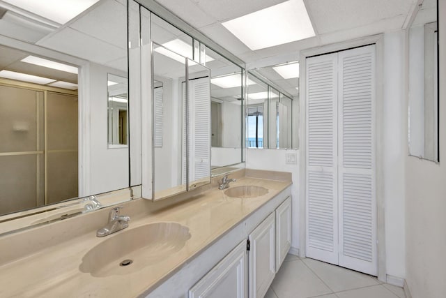 10000 S Ocean Dr S Unit 601, Jensen Beach, FL 34957 - bathroom with a closet, a sink, and a paneled ceiling