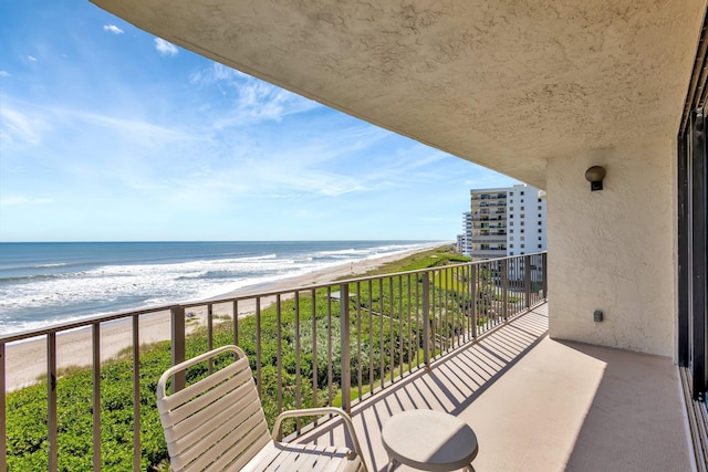 10000 S Ocean Dr S Unit 601, Jensen Beach, FL 34957 - balcony with a water view and a beach view