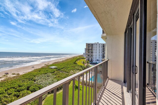 10000 S Ocean Dr S Unit 601, Jensen Beach, FL 34957 - balcony featuring a water view and a beach view