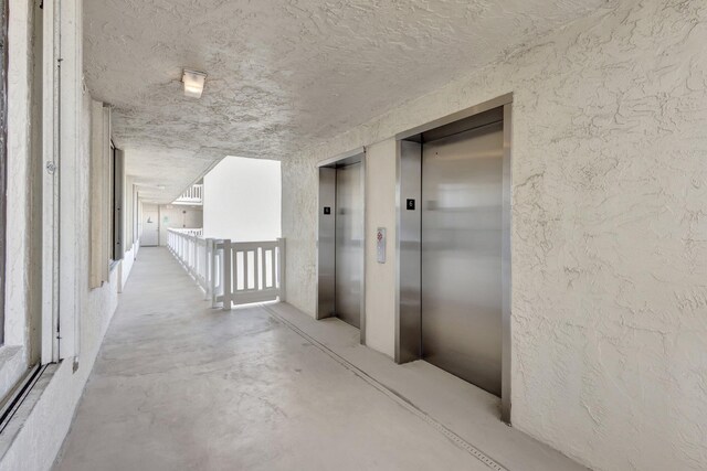 10000 S Ocean Dr S Unit 601, Jensen Beach, FL 34957 - hallway featuring elevator