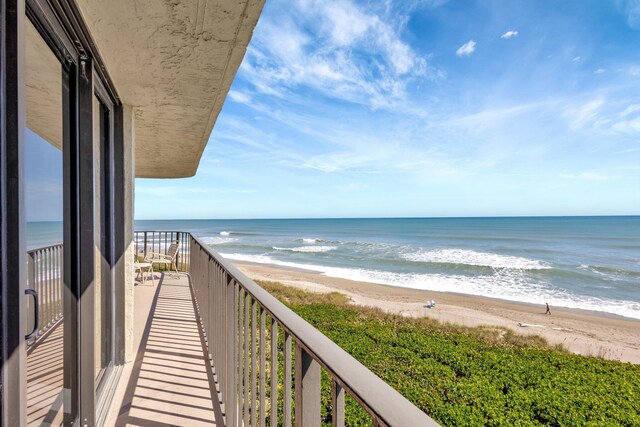 10000 S Ocean Dr S Unit 601, Jensen Beach, FL 34957 - balcony with a beach view and a water view