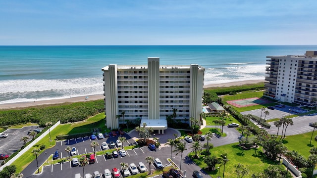 10000 S Ocean Dr S Unit 601, Jensen Beach, FL 34957 - drone / aerial view featuring a view of the beach and a water view