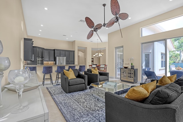 8888 Rockridge Glen Cv, Boynton Beach, FL 33473 - living area with light tile patterned floors, visible vents, ceiling fan with notable chandelier, and recessed lighting