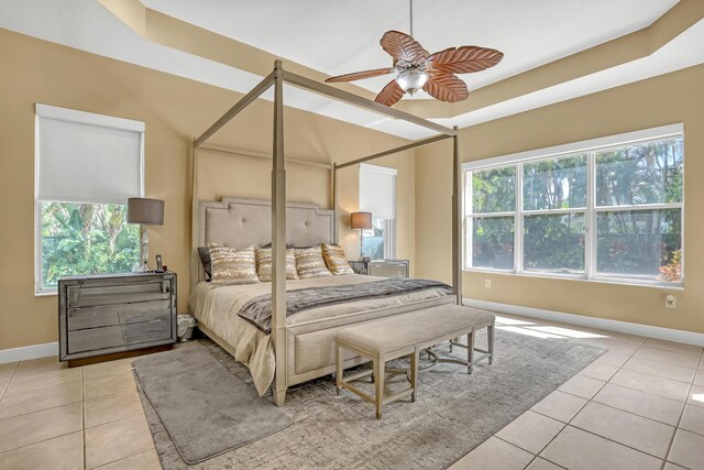 8888 Rockridge Glen Cv, Boynton Beach, FL 33473 - bedroom with baseboards, ceiling fan, and light tile patterned floors