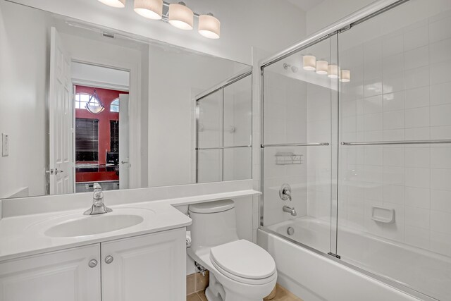 8888 Rockridge Glen Cv, Boynton Beach, FL 33473 - bathroom featuring enclosed tub / shower combo, toilet, and vanity