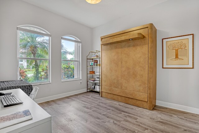8888 Rockridge Glen Cv, Boynton Beach, FL 33473 - interior space with baseboards and light wood-style flooring