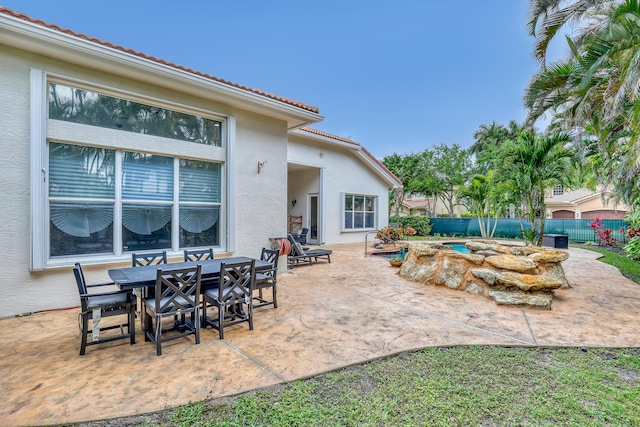 8888 Rockridge Glen Cv, Boynton Beach, FL 33473 - view of patio / terrace with fence and outdoor dining space