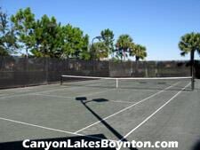 8888 Rockridge Glen Cv, Boynton Beach, FL 33473 - view of tennis court featuring community basketball court and fence