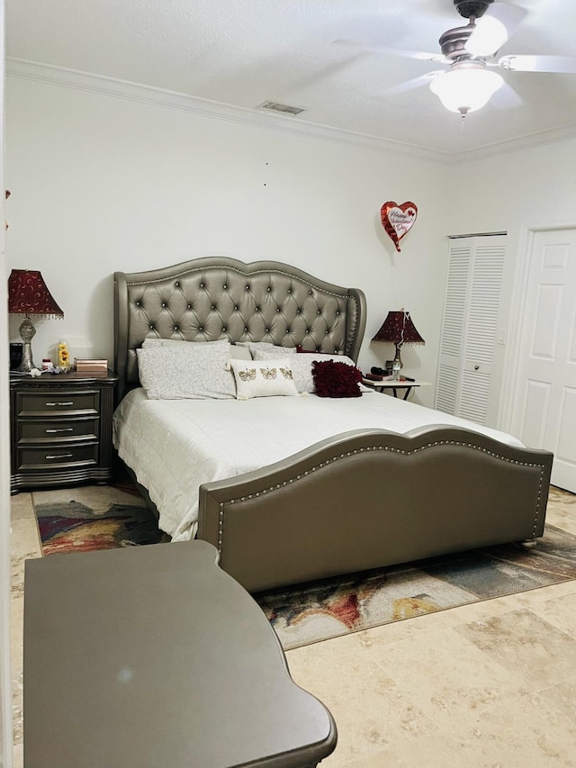 bedroom with ornamental molding and a ceiling fan