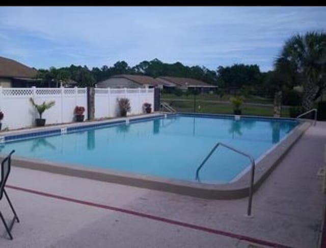 6020 Indrio Rd Unit 6, Fort Pierce, FL 34950 - community pool featuring fence