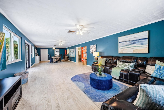 14283 Joan Dr, Palm Beach Gardens, FL 33410 - living area featuring ornamental molding, wood finished floors, and ceiling fan