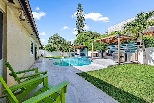 14283 Joan Dr, Palm Beach Gardens, FL 33410 - view of pool featuring a pergola, a fenced backyard, exterior kitchen, and a patio