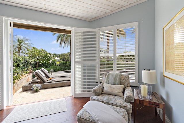 2990 Twin Oaks Way, Wellington, FL 33414 - living area featuring a healthy amount of sunlight, wooden ceiling, and wood finished floors