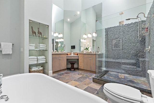 2990 Twin Oaks Way, Wellington, FL 33414 - full bathroom with vanity, a high ceiling, a soaking tub, stone finish flooring, and a shower stall