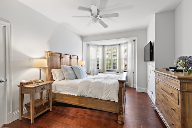 2990 Twin Oaks Way, Wellington, FL 33414 - bedroom featuring baseboards, ceiling fan, and dark wood-style flooring