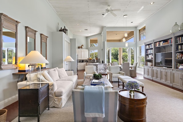 2990 Twin Oaks Way, Wellington, FL 33414 - carpeted living area with a ceiling fan, baseboards, wooden ceiling, and a towering ceiling