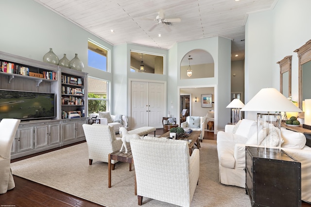 2990 Twin Oaks Way, Wellington, FL 33414 - living area featuring a ceiling fan, a high ceiling, wood finished floors, and wooden ceiling