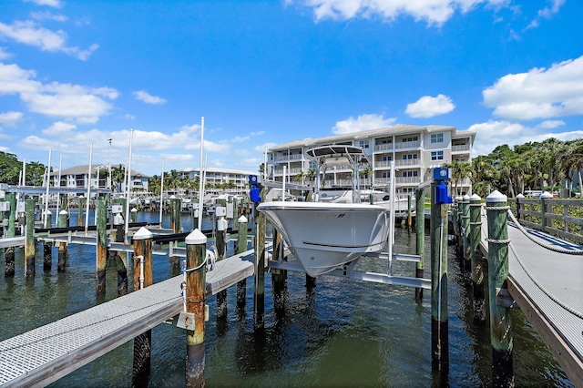 411 Bay Colony Drive N & Slip #32, Juno Beach, FL 33408 - dock area featuring boat lift and a water view