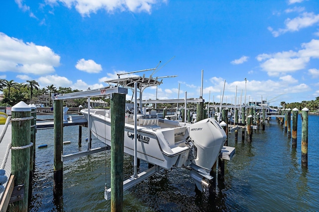 411 Bay Colony Drive N & Slip #32, Juno Beach, FL 33408 - dock area with a water view and boat lift
