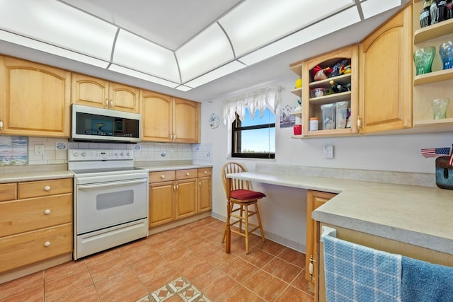 kitchen with stainless steel microwave, tasteful backsplash, open shelves, and electric stove