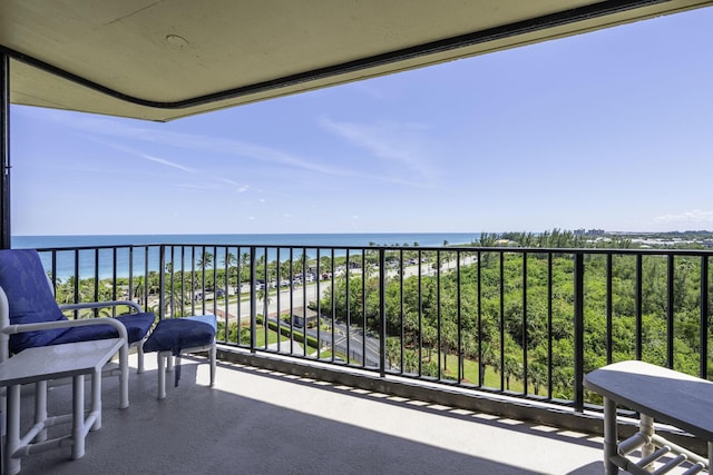 balcony featuring a water view