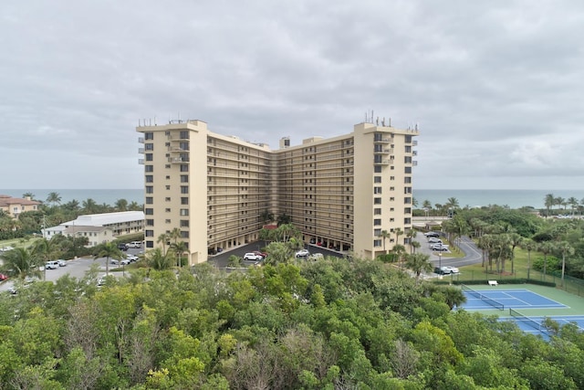 view of building exterior with a water view