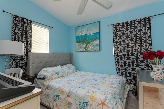 3899 Tuskegee Dr, Lake Worth, FL 33462 - tiled bedroom featuring vaulted ceiling and ceiling fan