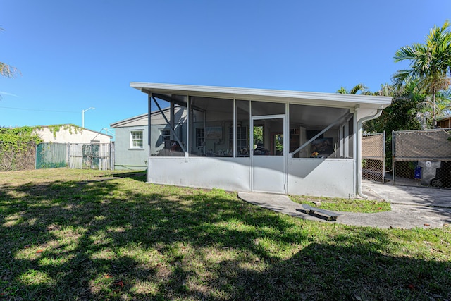 3899 Tuskegee Dr, Lake Worth, FL 33462 - back of house with a sunroom