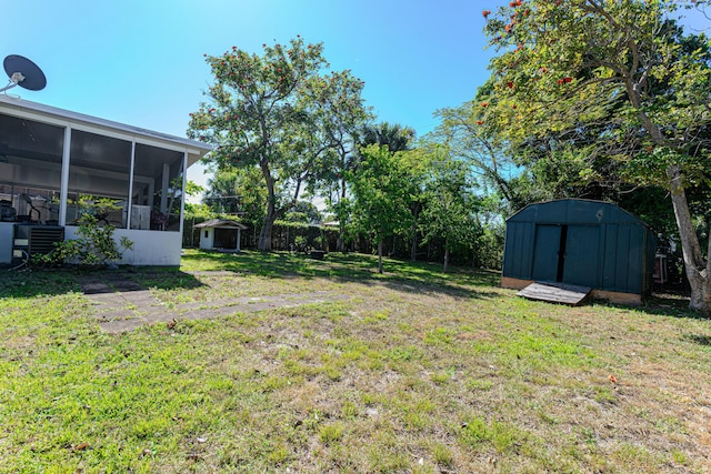 3899 Tuskegee Dr, Lake Worth, FL 33462 - view of green lawn with a sunroom