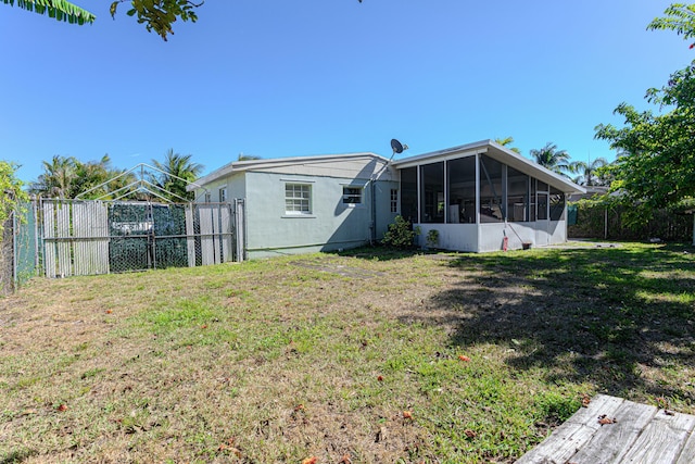 3899 Tuskegee Dr, Lake Worth, FL 33462 - back of house featuring a sunroom