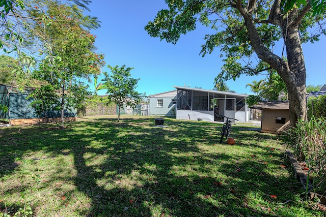 3899 Tuskegee Dr, Lake Worth, FL 33462 - view of yard with a sunroom