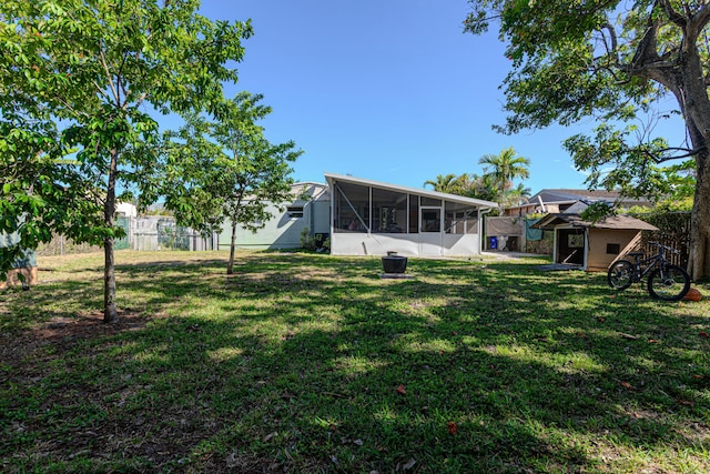 3899 Tuskegee Dr, Lake Worth, FL 33462 - view of yard featuring a sunroom