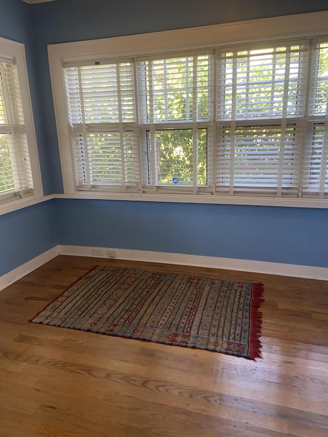 220 Malverne Rd, West Palm Beach, FL 33405 - interior space featuring baseboards and wood finished floors