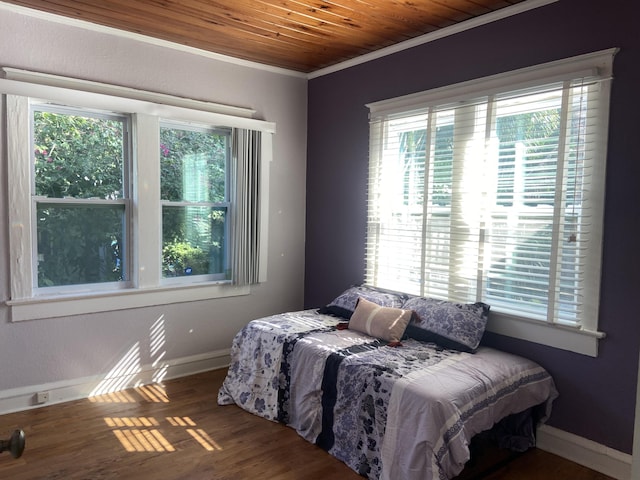 220 Malverne Rd, West Palm Beach, FL 33405 - bedroom with wood ceiling, baseboards, crown molding, and wood finished floors